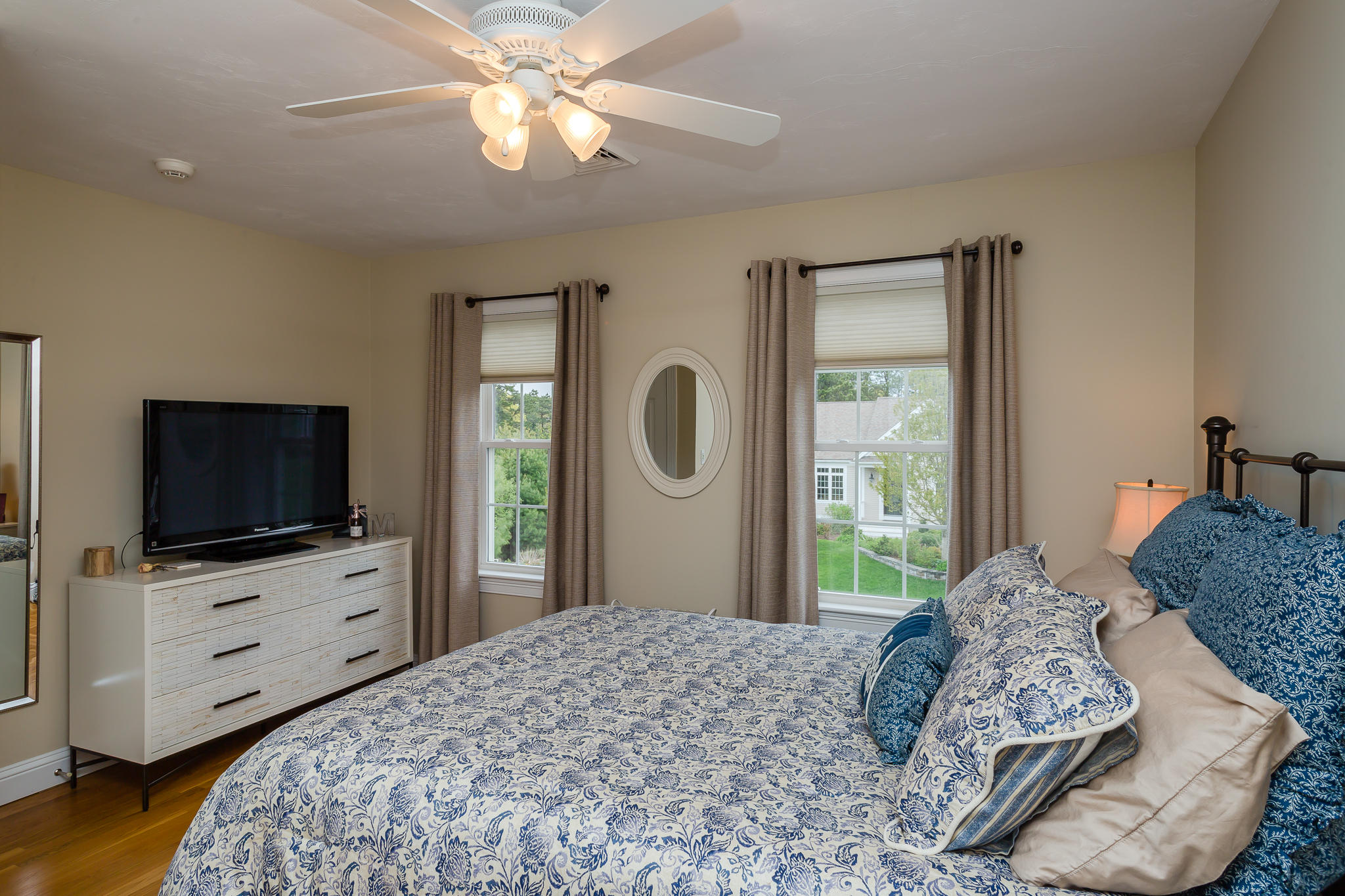 85 Palmer Road Mashpee, MA 02649 - Photo 23 of 38 a bedroom with a bed and a flat screen tv