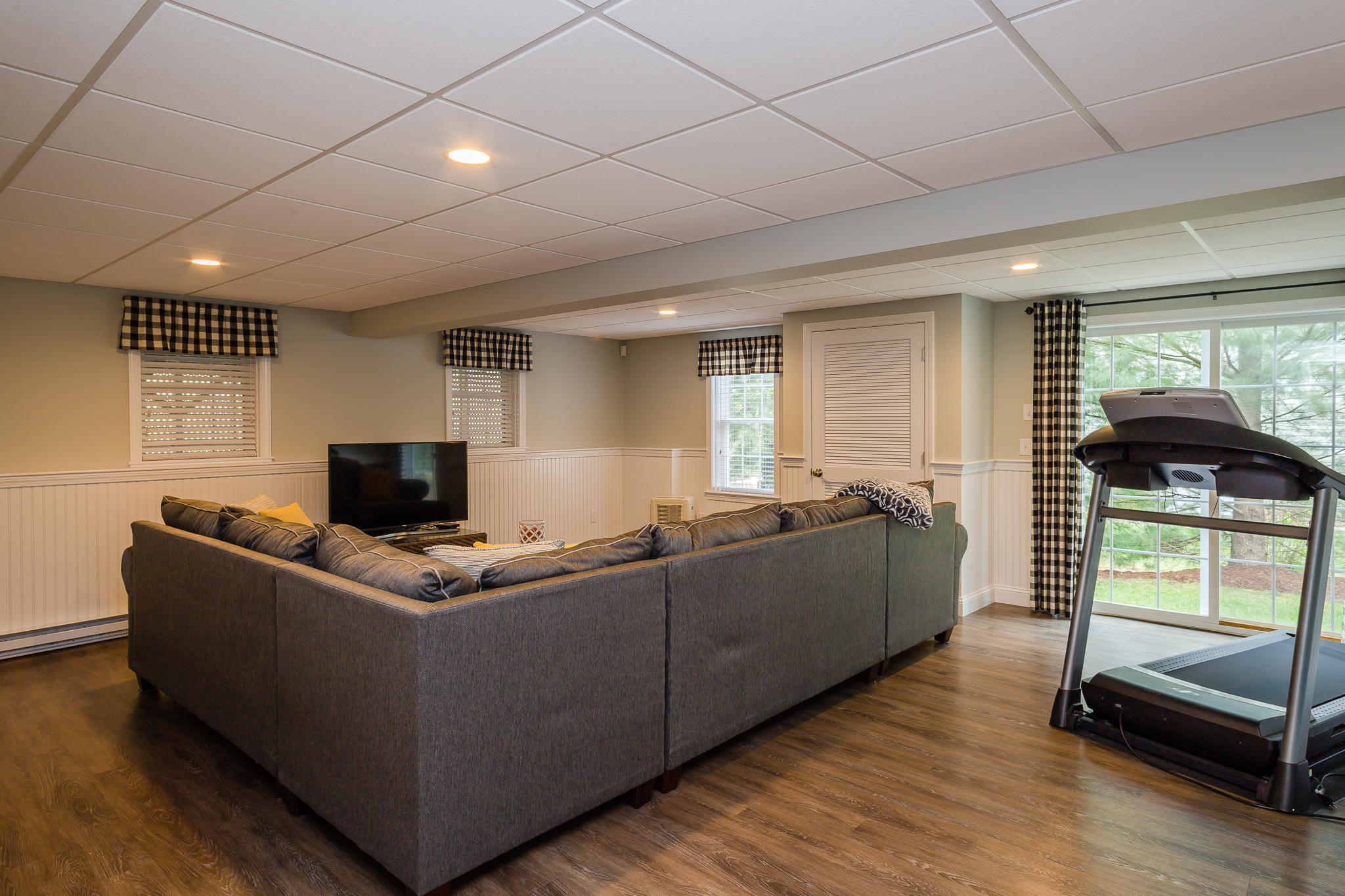 85 Palmer Road Mashpee, MA 02649 - Photo 27 of 38 a living room with furniture and a flat screen tv