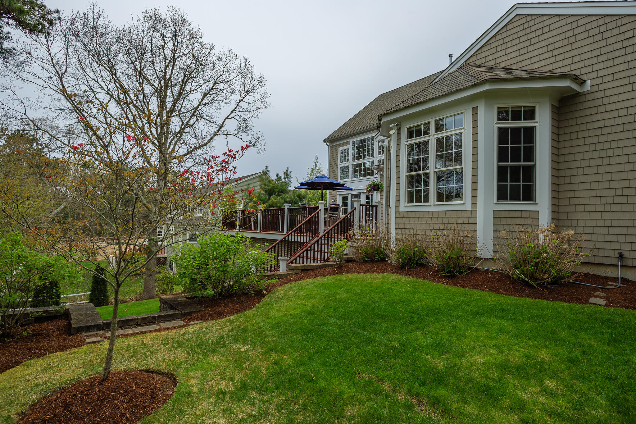 85 Palmer Road Mashpee, MA 02649 - Photo 33 of 38 a view of a house with a yard
