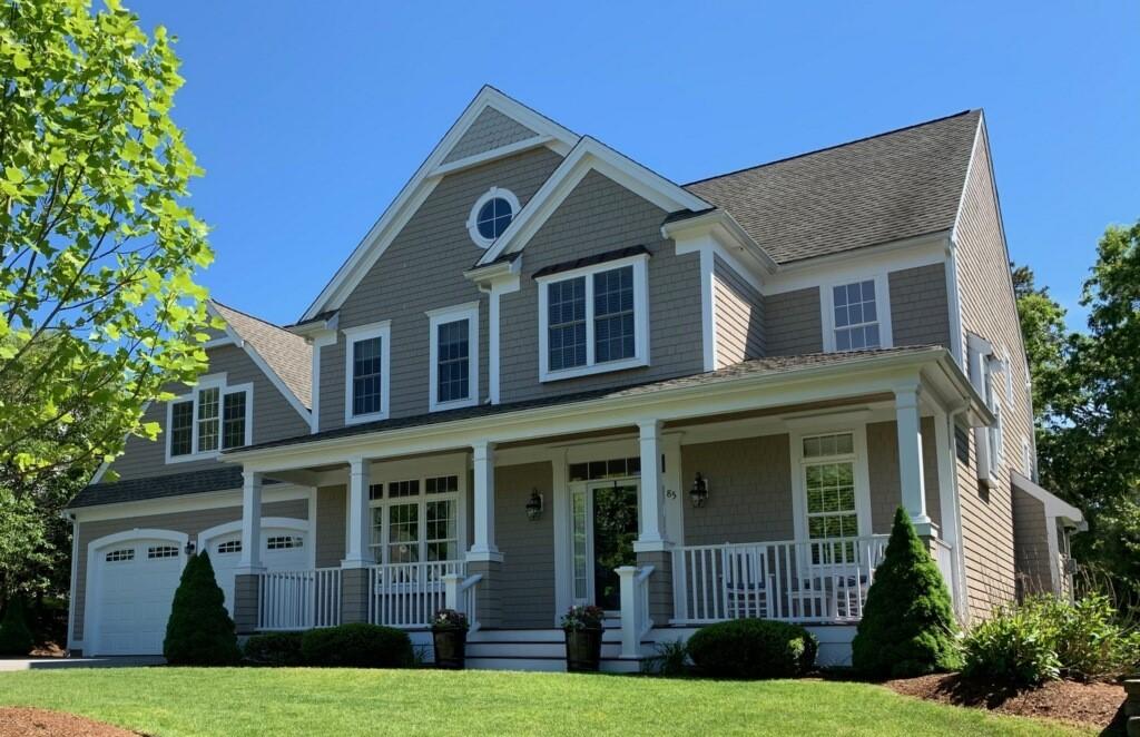 85 Palmer Road Mashpee, MA 02649 - Photo 4 of 38 a front view of a house with garden