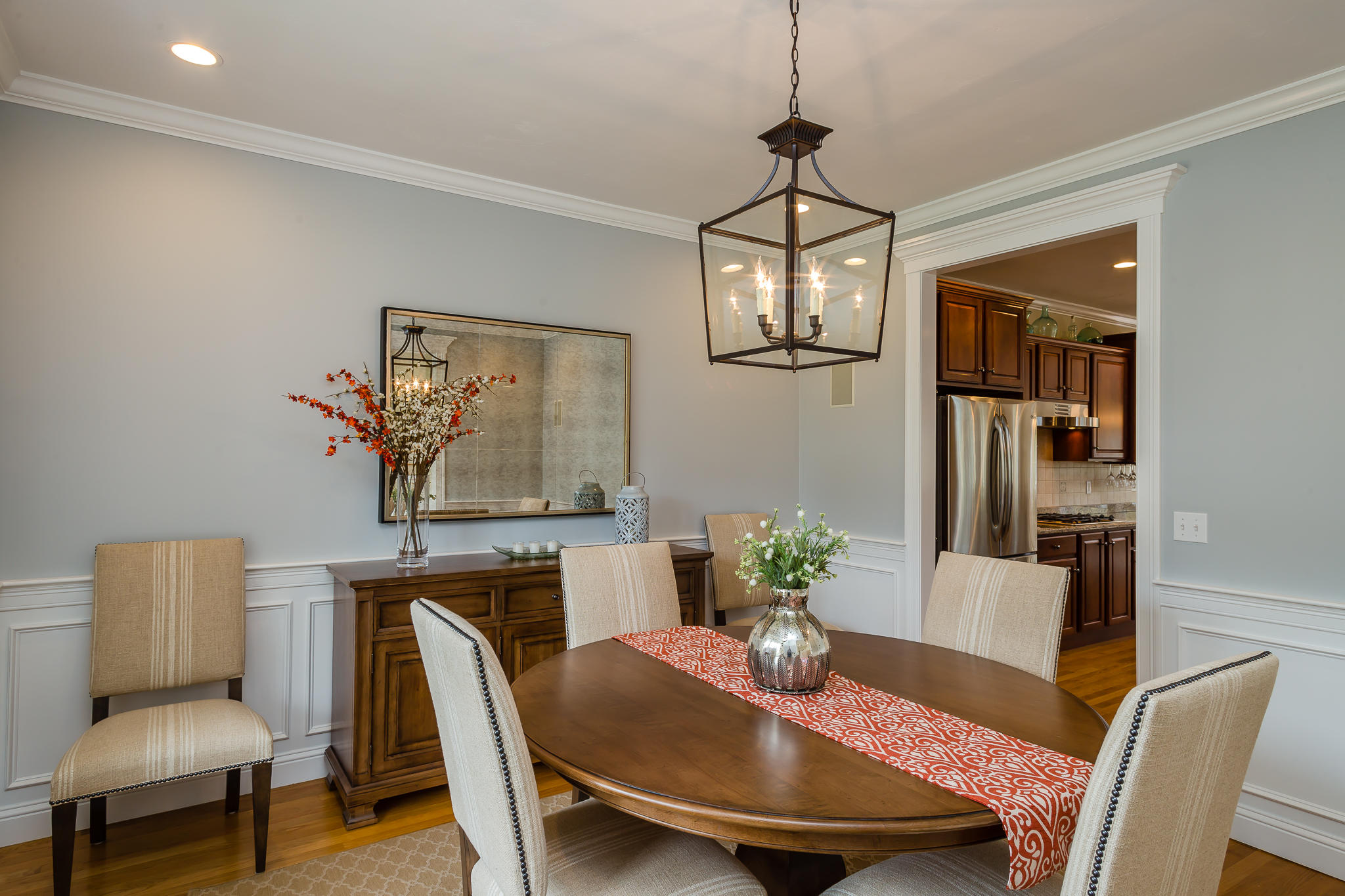 85 Palmer Road Mashpee, MA 02649 - Photo 10 of 38 a view of a dining room with furniture wooden floor and a chandelier