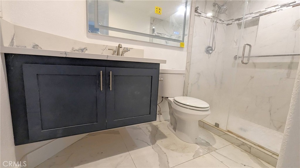 14363 Auburn Court Chino Hills, CA 91709 - Photo 12 of 27 a bathroom with a sink toilet and shower