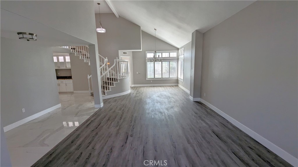 14363 Auburn Court Chino Hills, CA 91709 - Photo 15 of 27 wooden floor in an empty room with a window