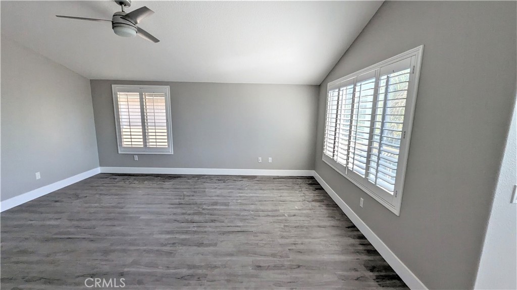 14363 Auburn Court Chino Hills, CA 91709 - Photo 18 of 27 a view of an empty room with a window and wooden floor