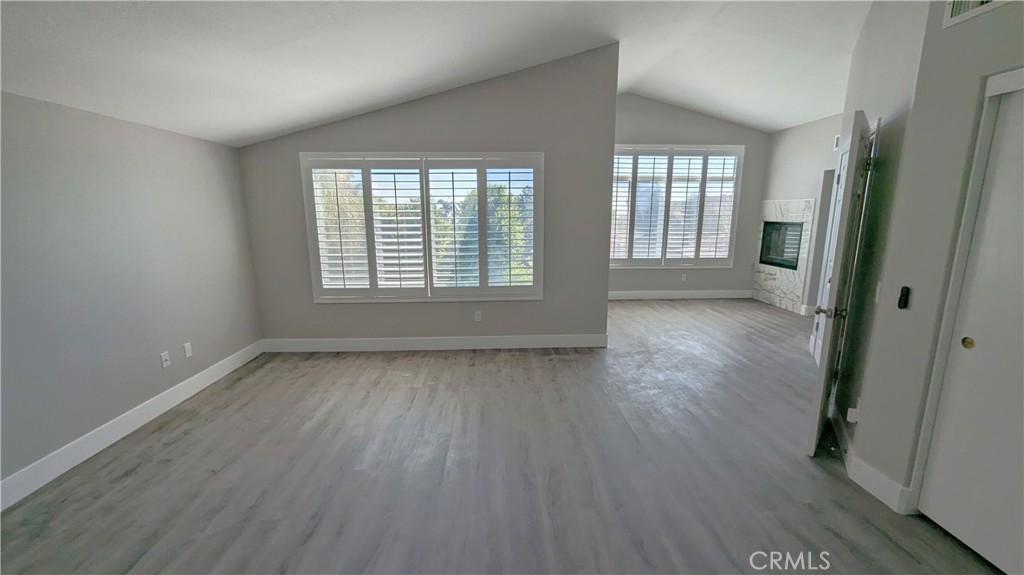 14363 Auburn Court Chino Hills, CA 91709 - Photo 21 of 27 an empty room with wooden floor and windows