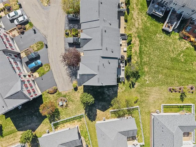 an aerial view of a house with a garden