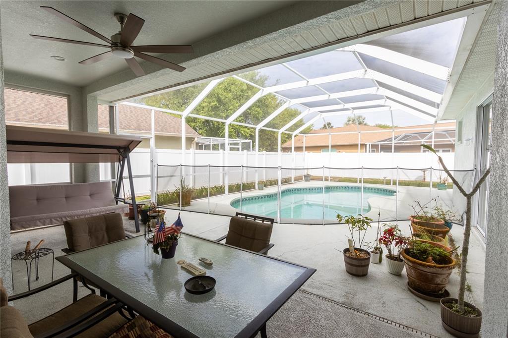 1812 Flower Branch Way Valrico, FL 33594 - Photo 34 of 42 a view of a dining room with furniture window and outside view