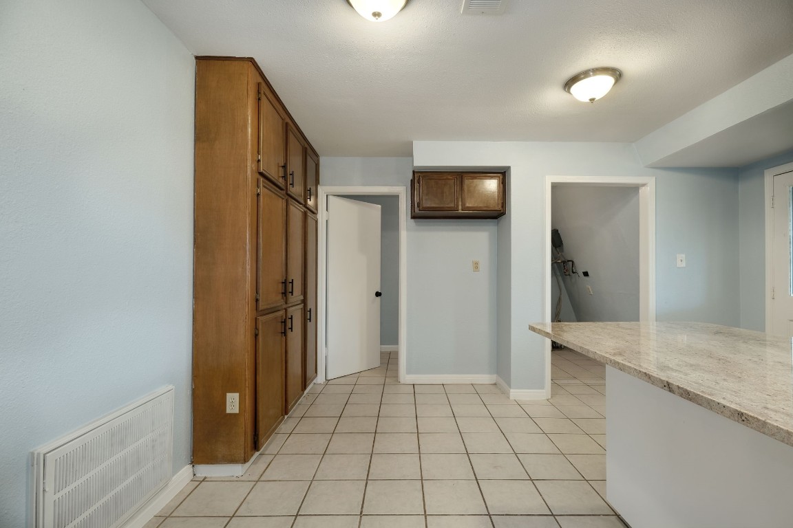 20500 Keilman Lane Pflugerville, TX 78660 - Photo 14 of 38 a view of a storage & utility room in a kitchen