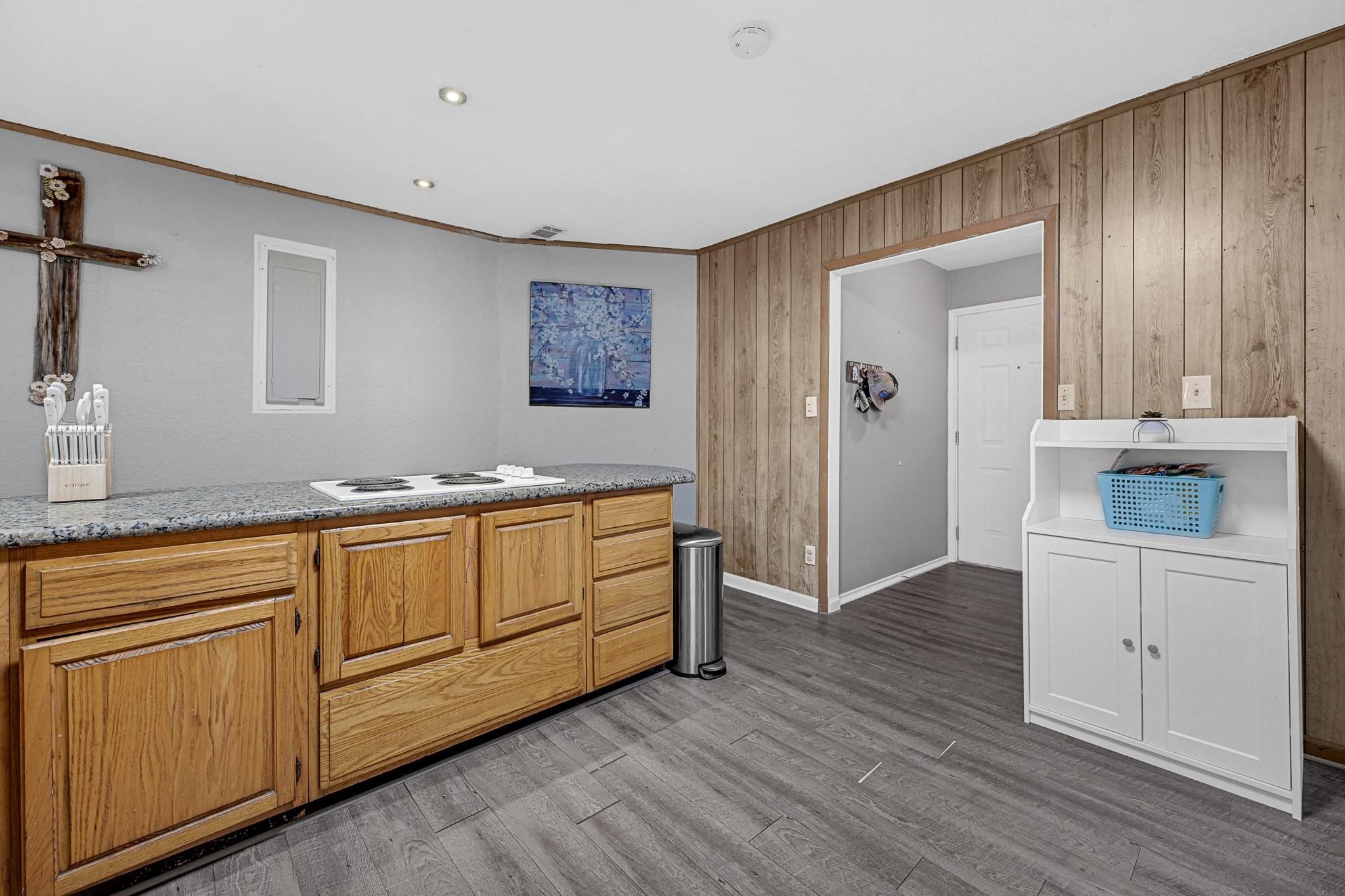 88 Gazebo Street, Unit AE Huntsville, TX 77340 - Photo 15 of 24 a spacious bathroom with a granite countertop sink and a mirror