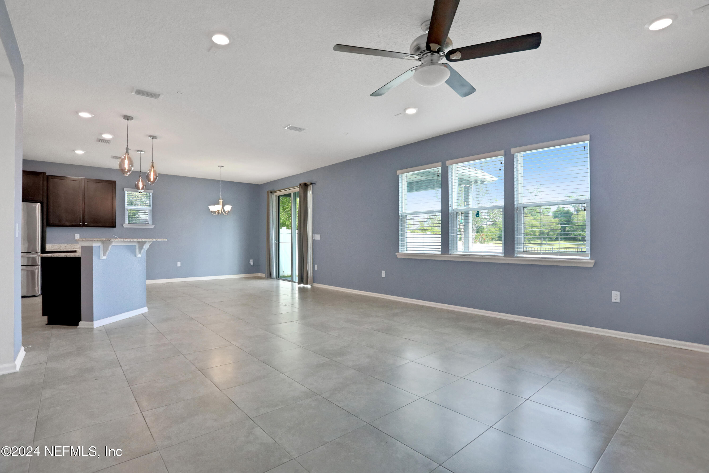 16055 Hutton Lane Jacksonville, FL 32218 - Photo 15 of 28 a view of a kitchen with a sink and a window