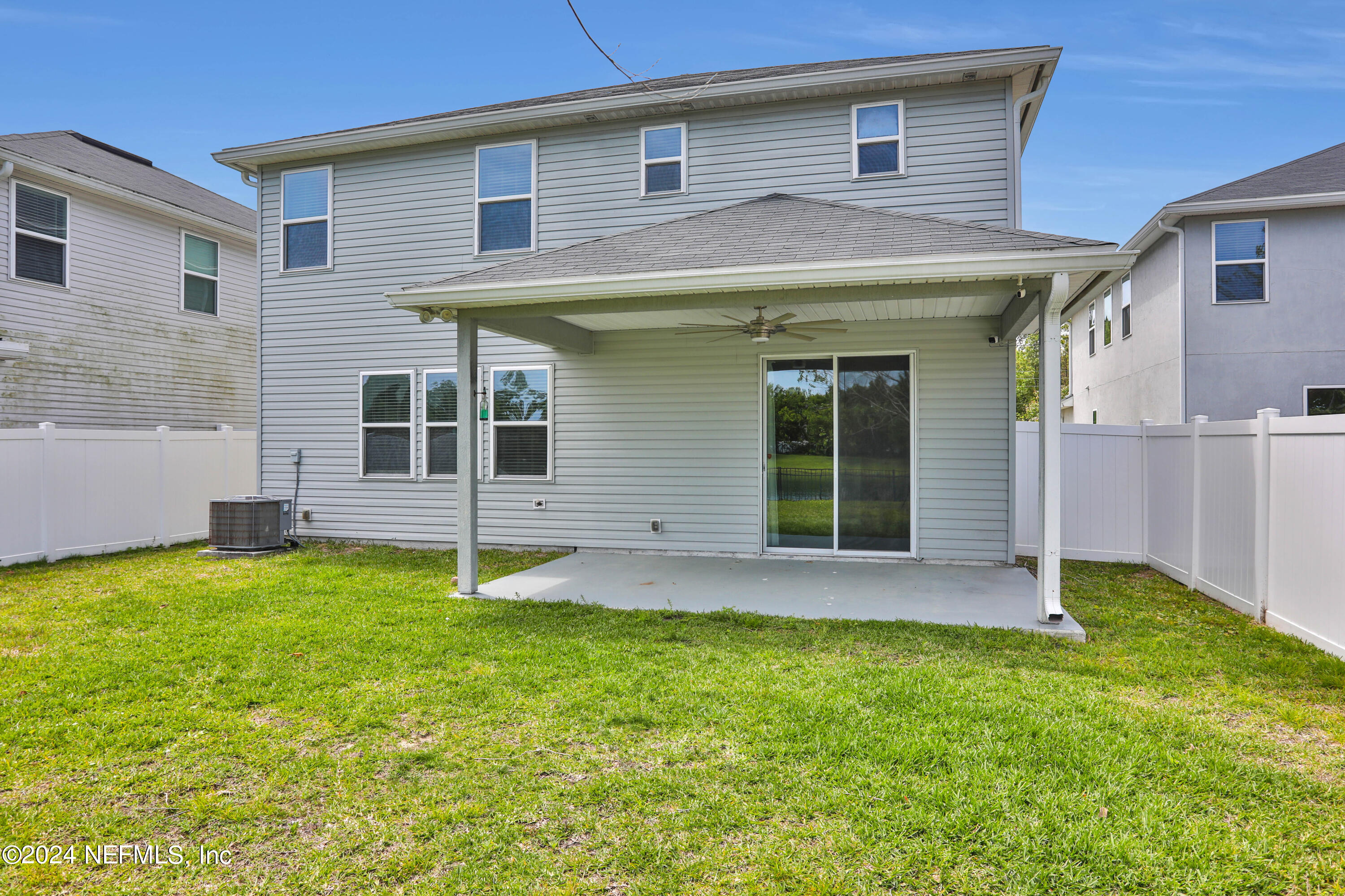 16055 Hutton Lane Jacksonville, FL 32218 - Photo 28 of 28 a front view of a house with a yard