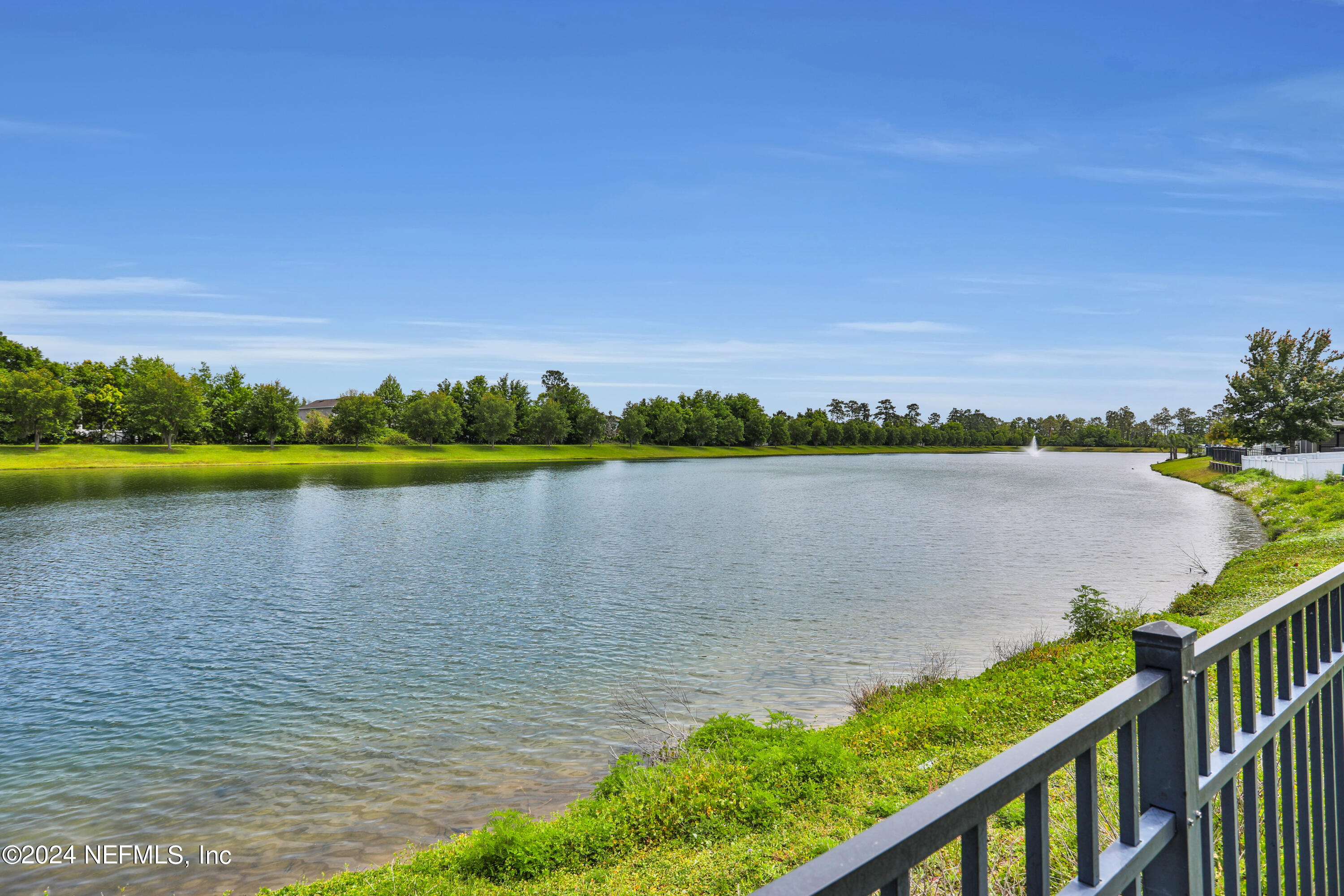 16055 Hutton Lane Jacksonville, FL 32218 - Photo 4 of 28 a view of a lake with a lake