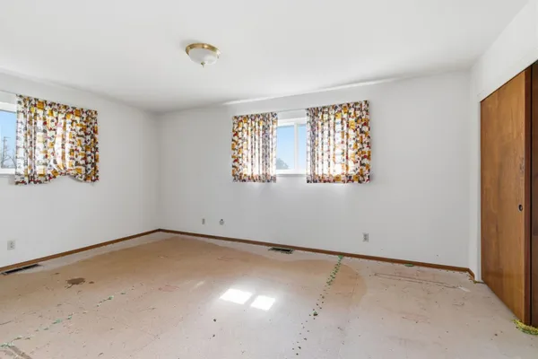 an empty room with a natural light