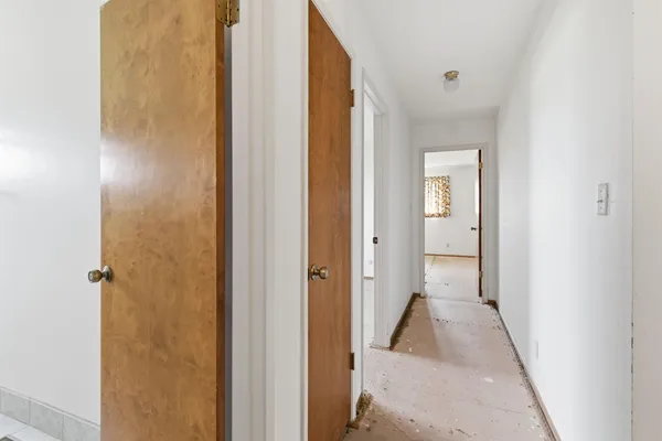 a view of bathroom with a sink and mirror