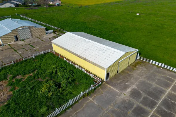 a view of a back yard of the house