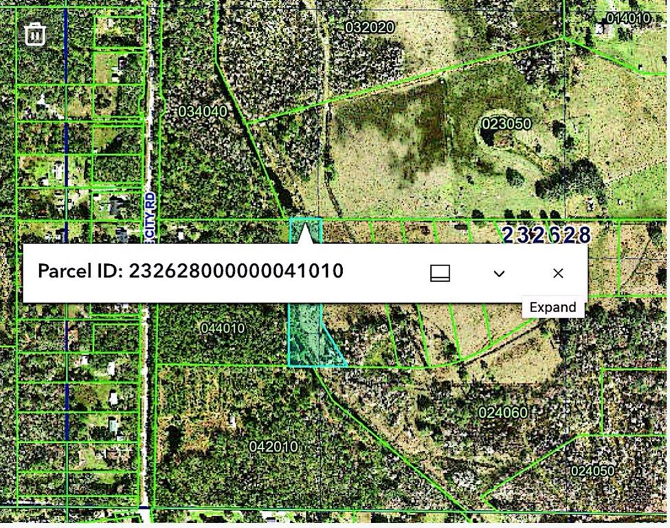 Old Dade City Road Lakeland, FL 33810 - Photo 1 of 1 a view of a sign in the garden