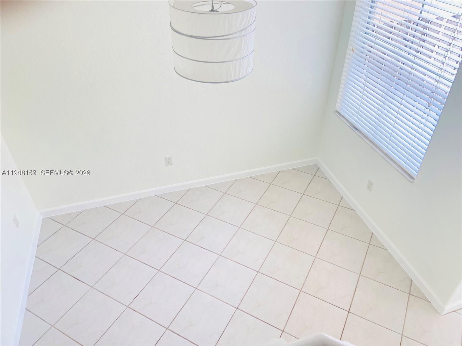 3363 Southwest 169th Terrace Miramar, FL 33027 - Photo 12 of 21 a view of an empty room