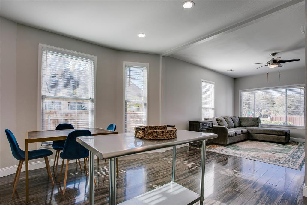 834 South Polk Street Dallas, TX 75208 - Photo 15 of 38 a living room with furniture and large windows