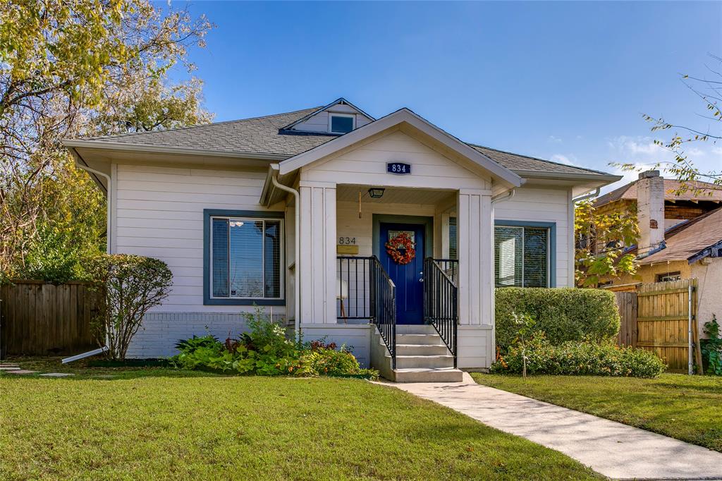 834 South Polk Street Dallas, TX 75208 - Photo 2 of 38 a front view of a house with a yard