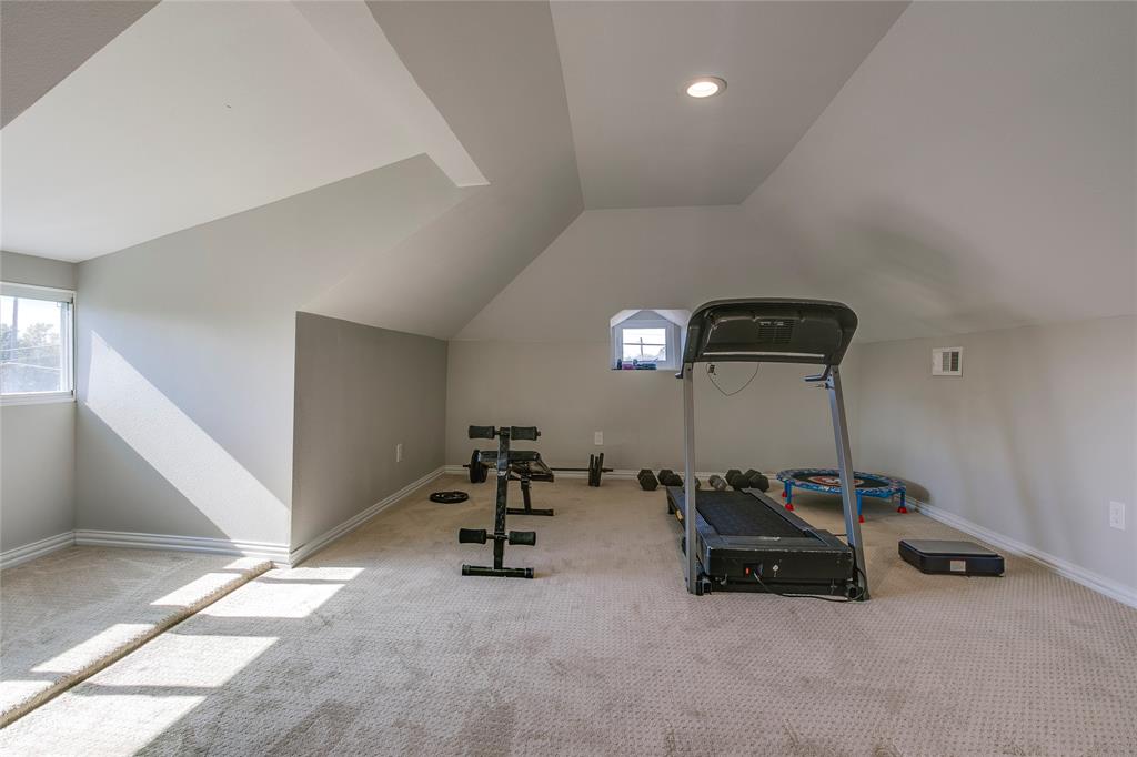 834 South Polk Street Dallas, TX 75208 - Photo 30 of 38 a living room with furniture and a mirror