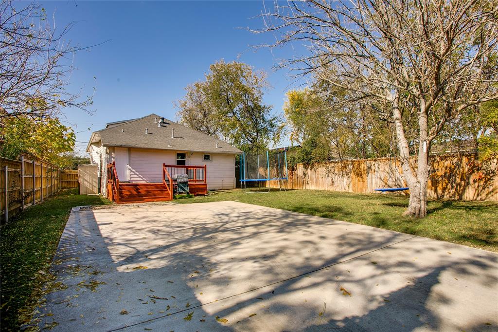 834 South Polk Street Dallas, TX 75208 - Photo 38 of 38 a view of a house with a yard and large tree