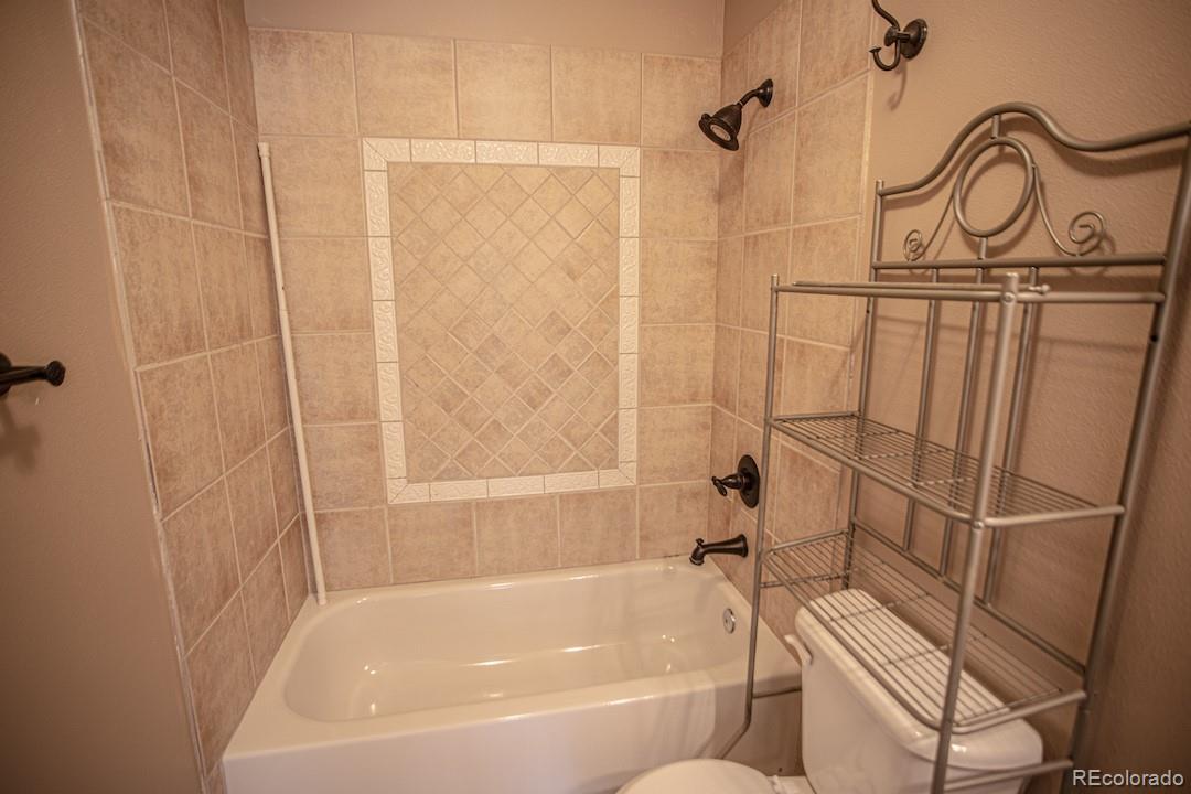 710 East Baseline Road Lafayette, CO 80026 - Photo 23 of 33 a bathroom with a bathtub