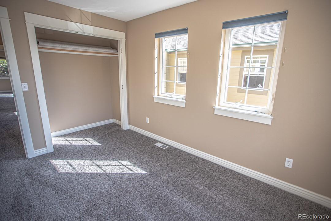 710 East Baseline Road Lafayette, CO 80026 - Photo 24 of 33 an empty room with windows