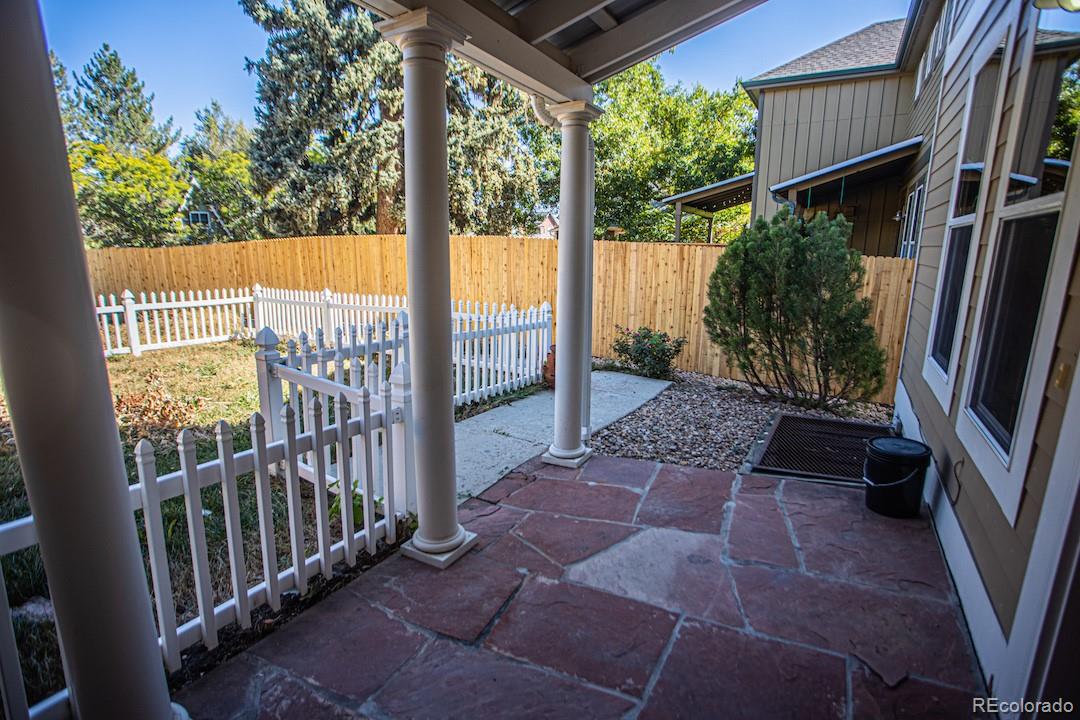 710 East Baseline Road Lafayette, CO 80026 - Photo 5 of 33 a view of a porch with furniture