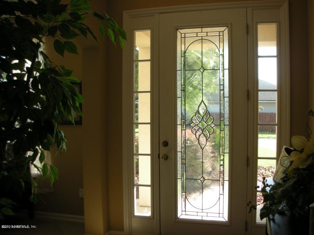 3409 South Saxxon Road St. Augustine, FL 32092 - Photo 2 of 15 a view of a large window with outside view