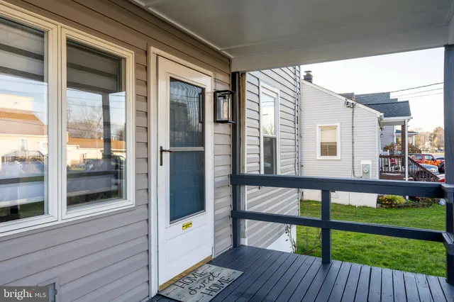 a balcony view with a glass door