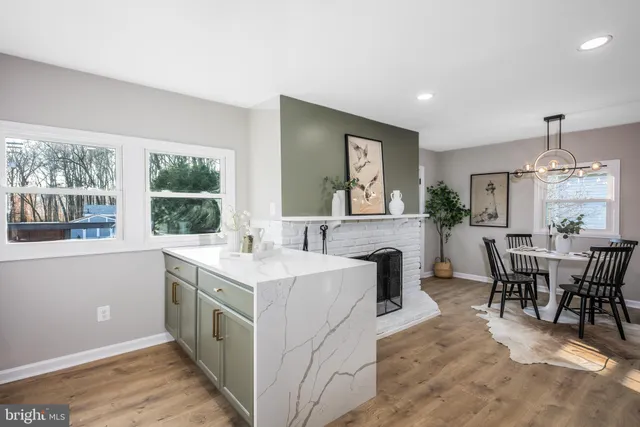 a kitchen with a sink and stove