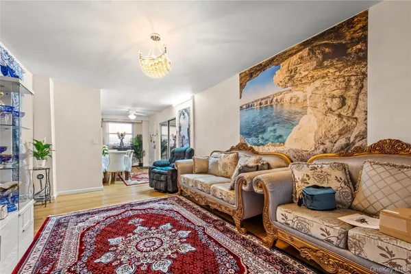 a living room with furniture and a rug