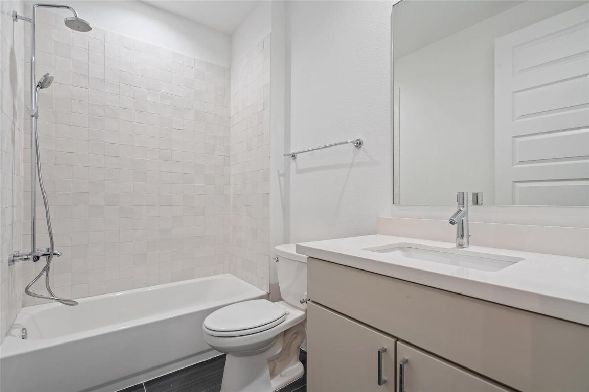 2505 Bluebonnet Lane, Unit 13 Austin, TX 78704 - Photo 21 of 29 Full bath with vanity and washtub / shower combination