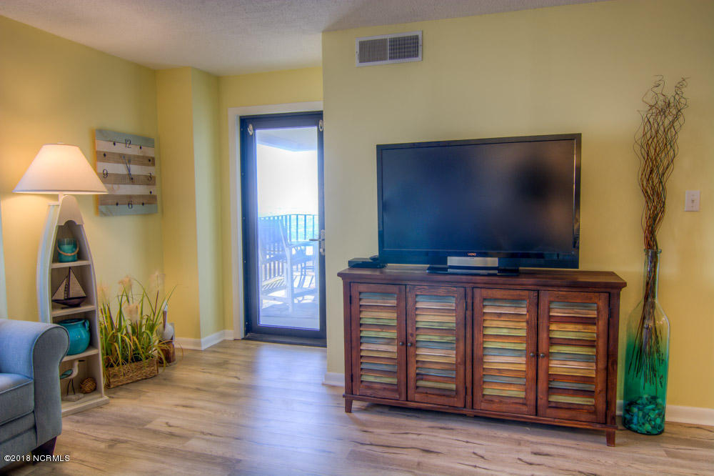 1505 Salter Path Road, Unit 223 Indian Beach, NC 28512 - Photo 5 of 47 Door to Balcony