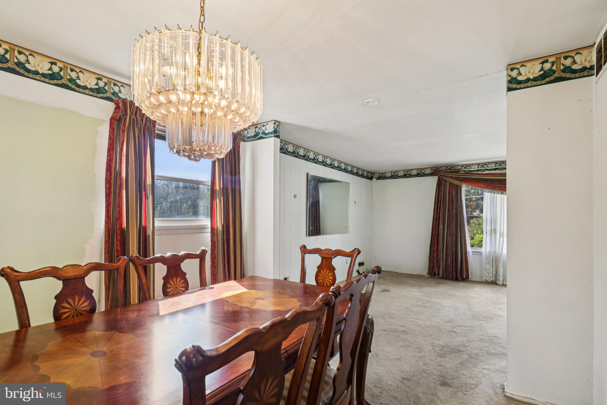 1916 Taylor Avenue Fort Washington, MD 20744 - Photo 13 of 64 a view of a dining room with furniture and chandelier