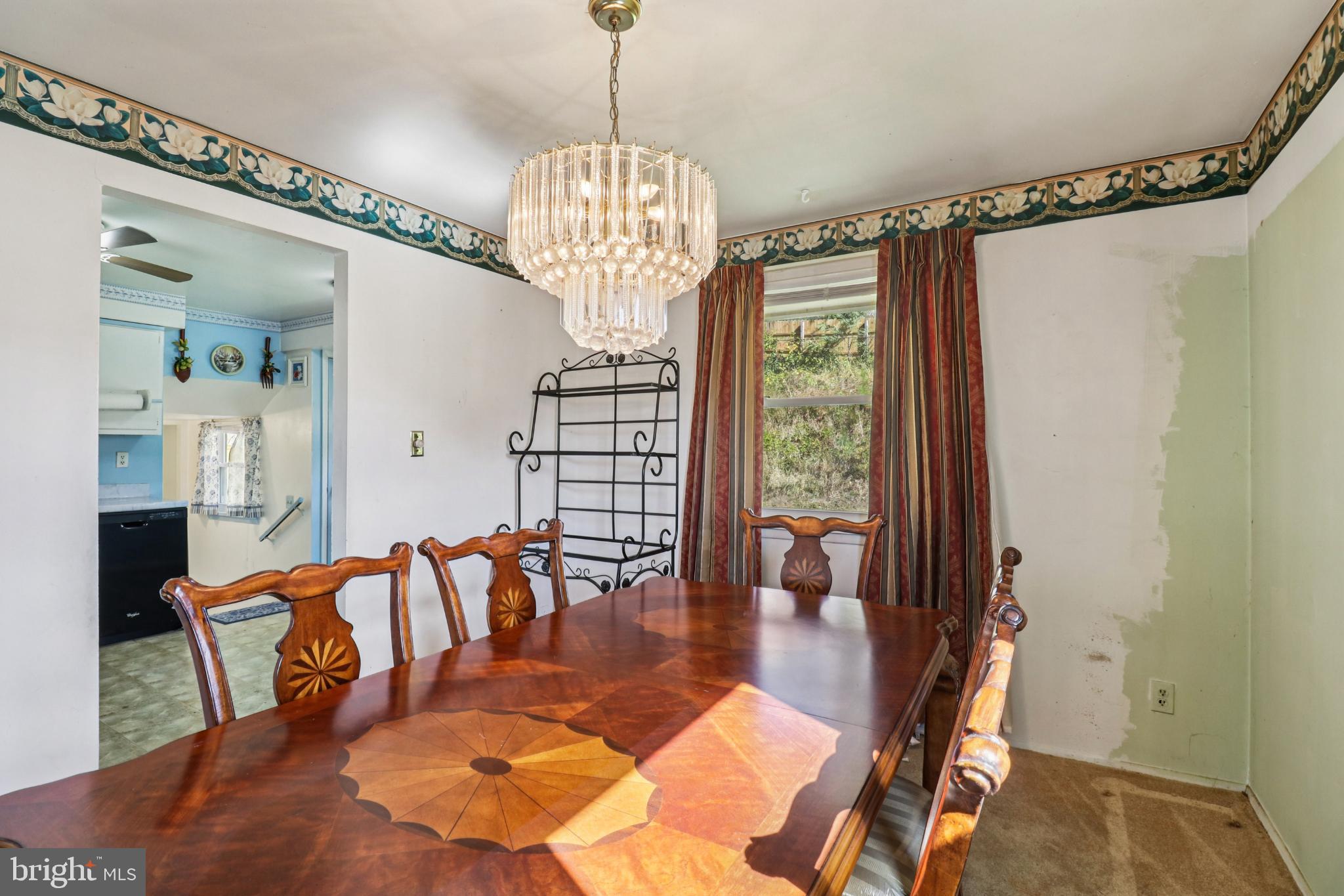 1916 Taylor Avenue Fort Washington, MD 20744 - Photo 14 of 64 a view of a dining room with furniture a chandelier and wooden floor