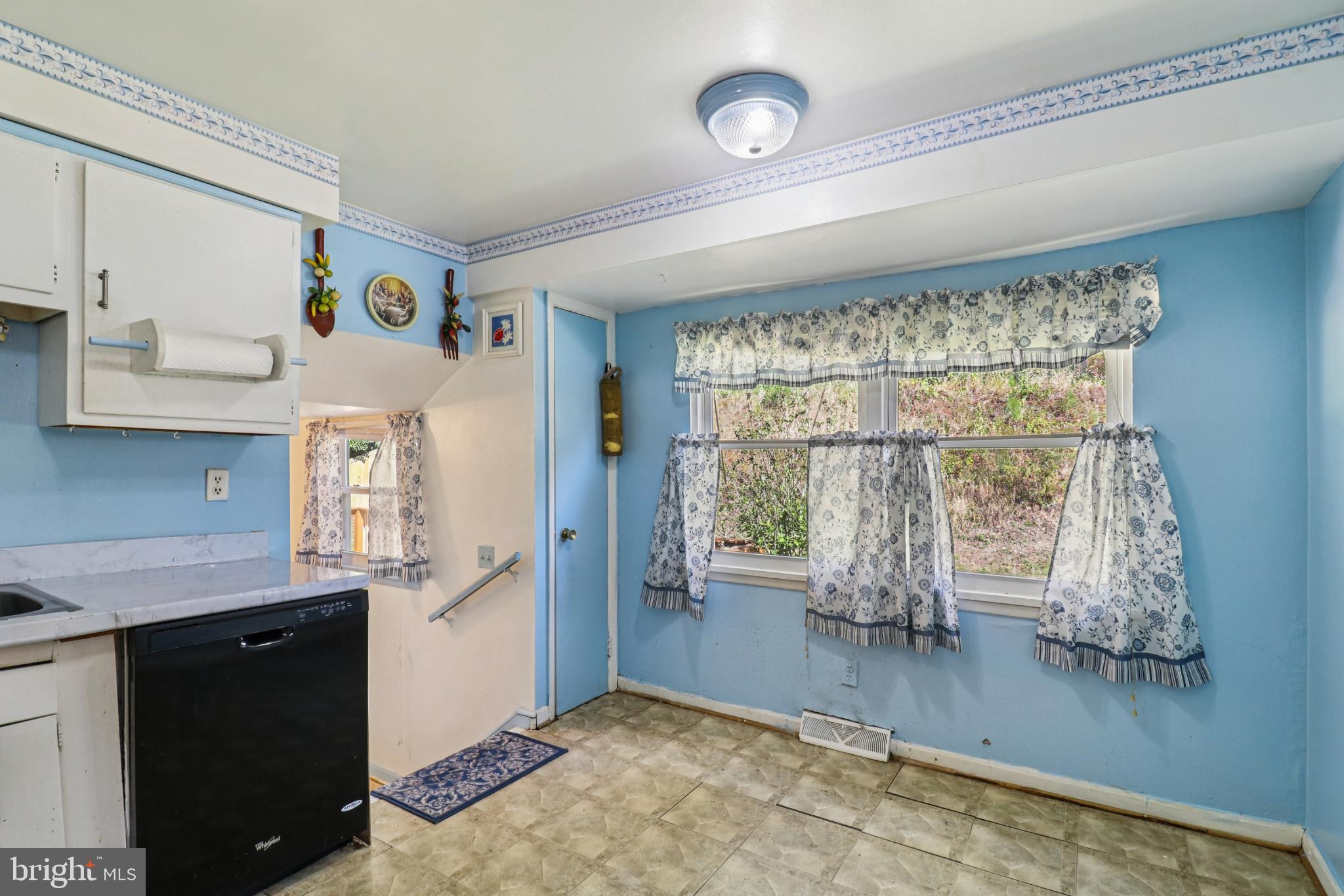 1916 Taylor Avenue Fort Washington, MD 20744 - Photo 18 of 64 Charming blue kitchen with natural light.