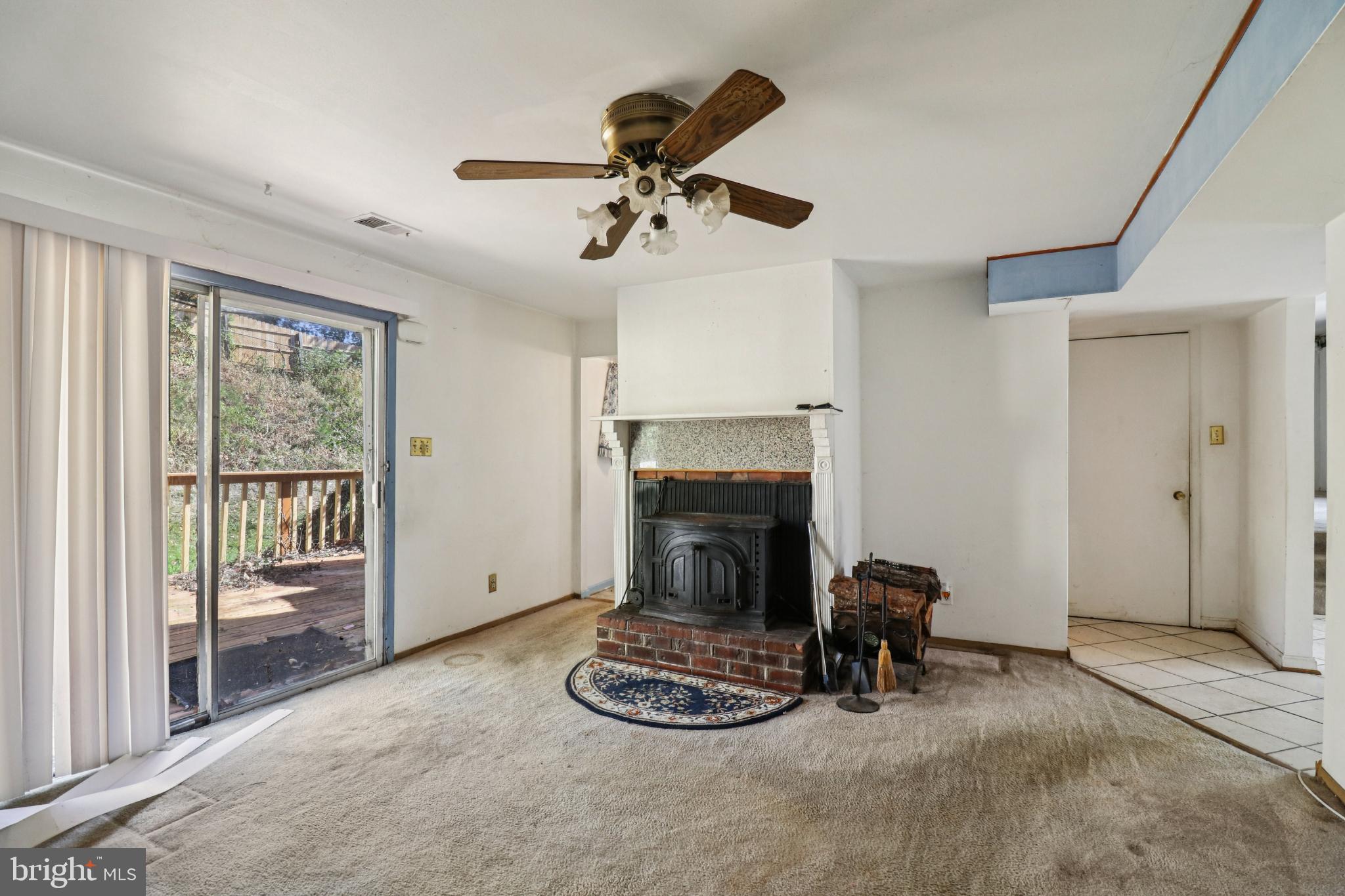 1916 Taylor Avenue Fort Washington, MD 20744 - Photo 21 of 64 a living room with furniture and a fireplace