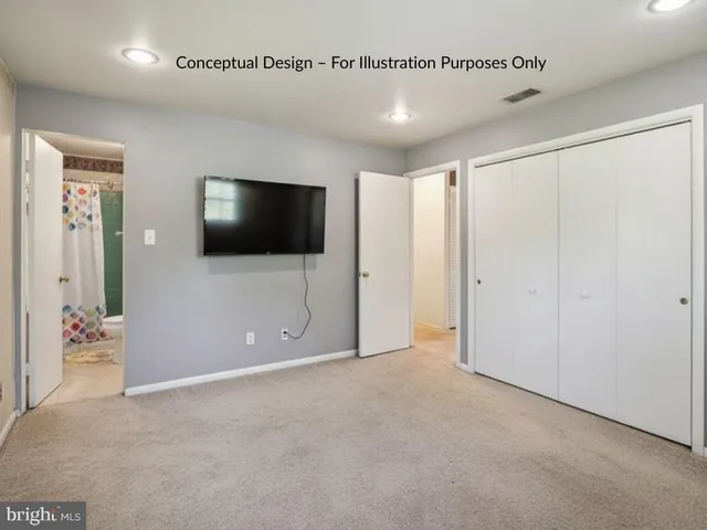 a view of a livingroom with a flat screen tv