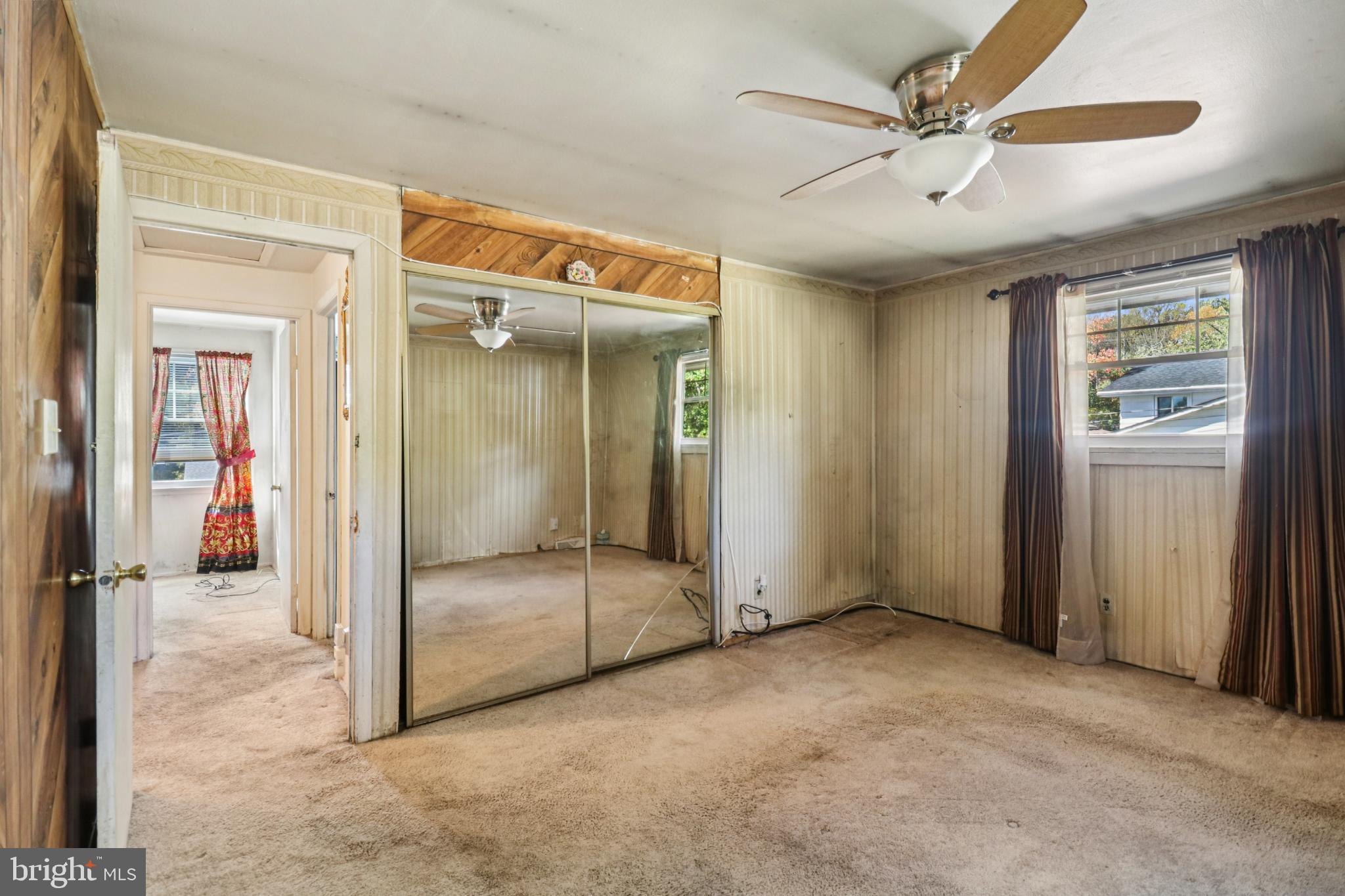 1916 Taylor Avenue Fort Washington, MD 20744 - Photo 37 of 64 an empty room with fan and a chandelier fan