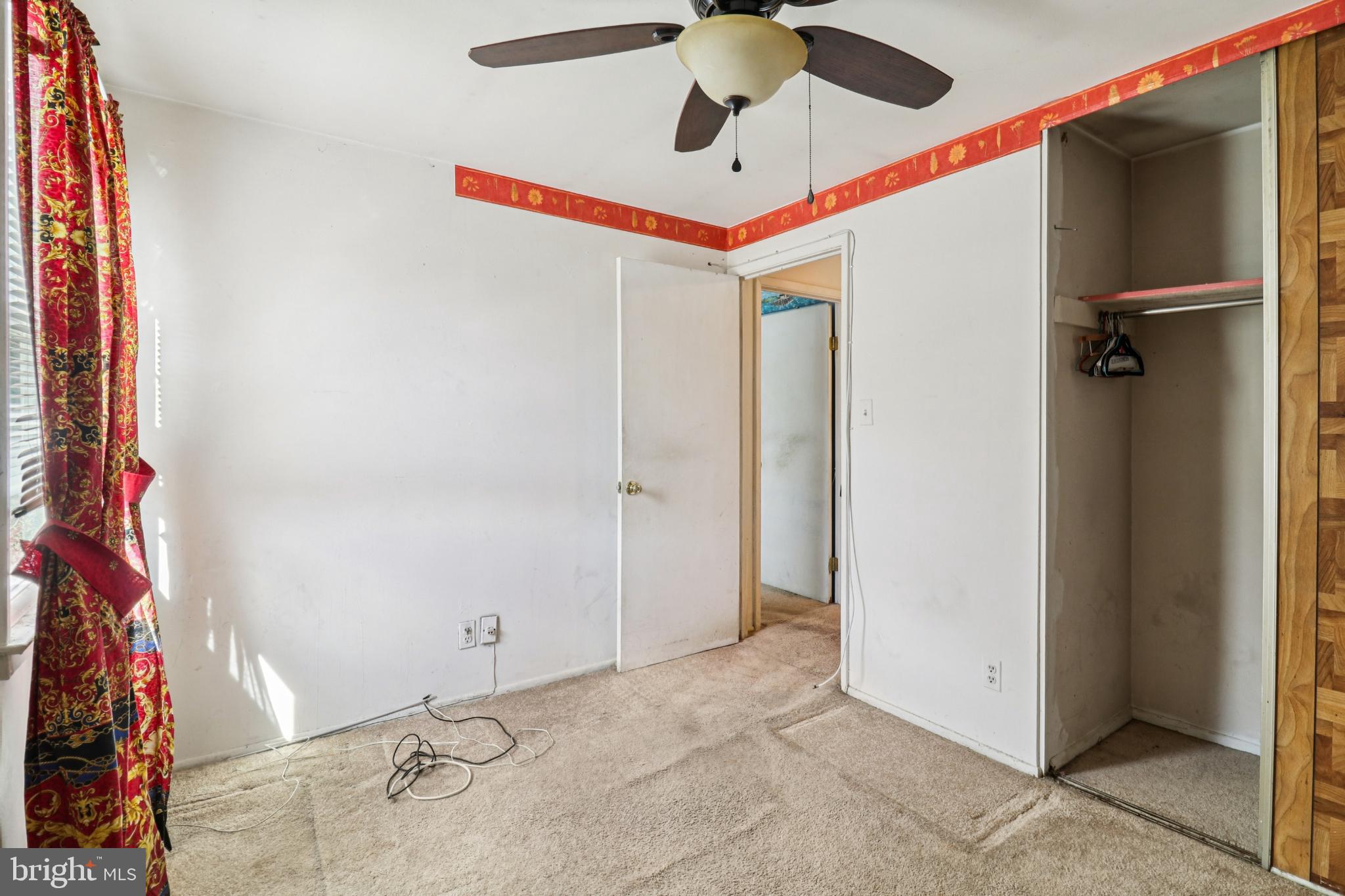 1916 Taylor Avenue Fort Washington, MD 20744 - Photo 44 of 64 a view of a room with a ceiling fan and closet