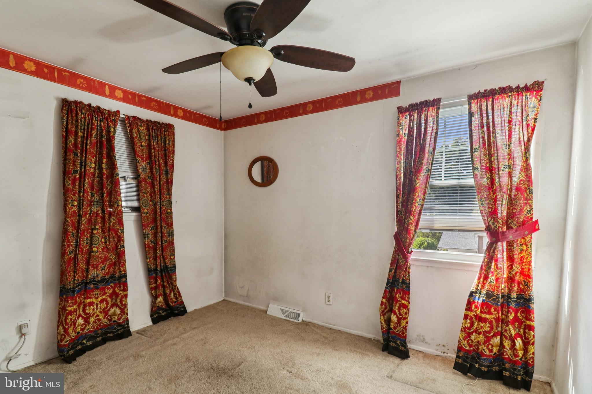 1916 Taylor Avenue Fort Washington, MD 20744 - Photo 45 of 64 Charming room with vibrant drapery accents.