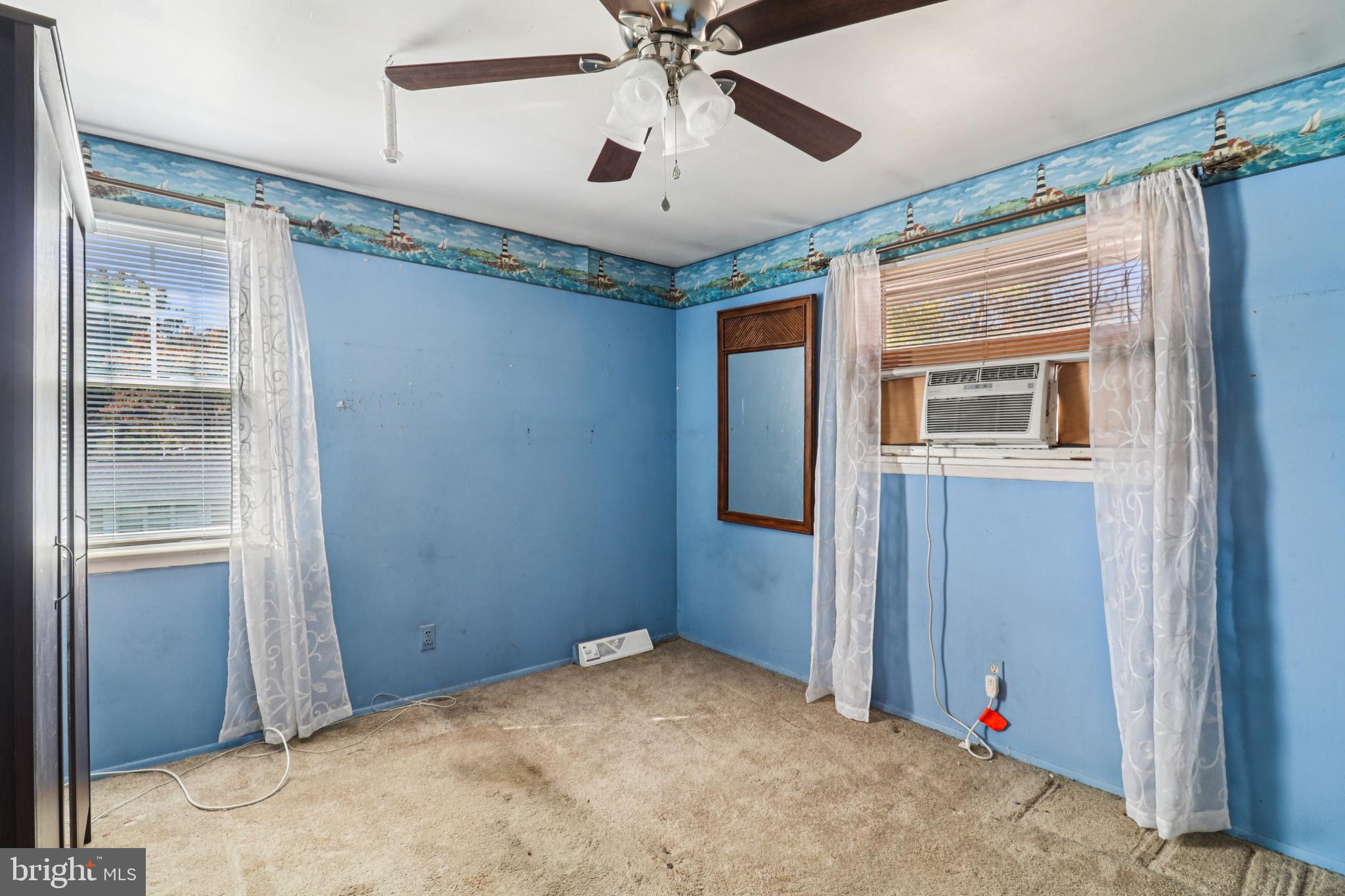 1916 Taylor Avenue Fort Washington, MD 20744 - Photo 46 of 64 a view of a livingroom with a ceiling fan and window