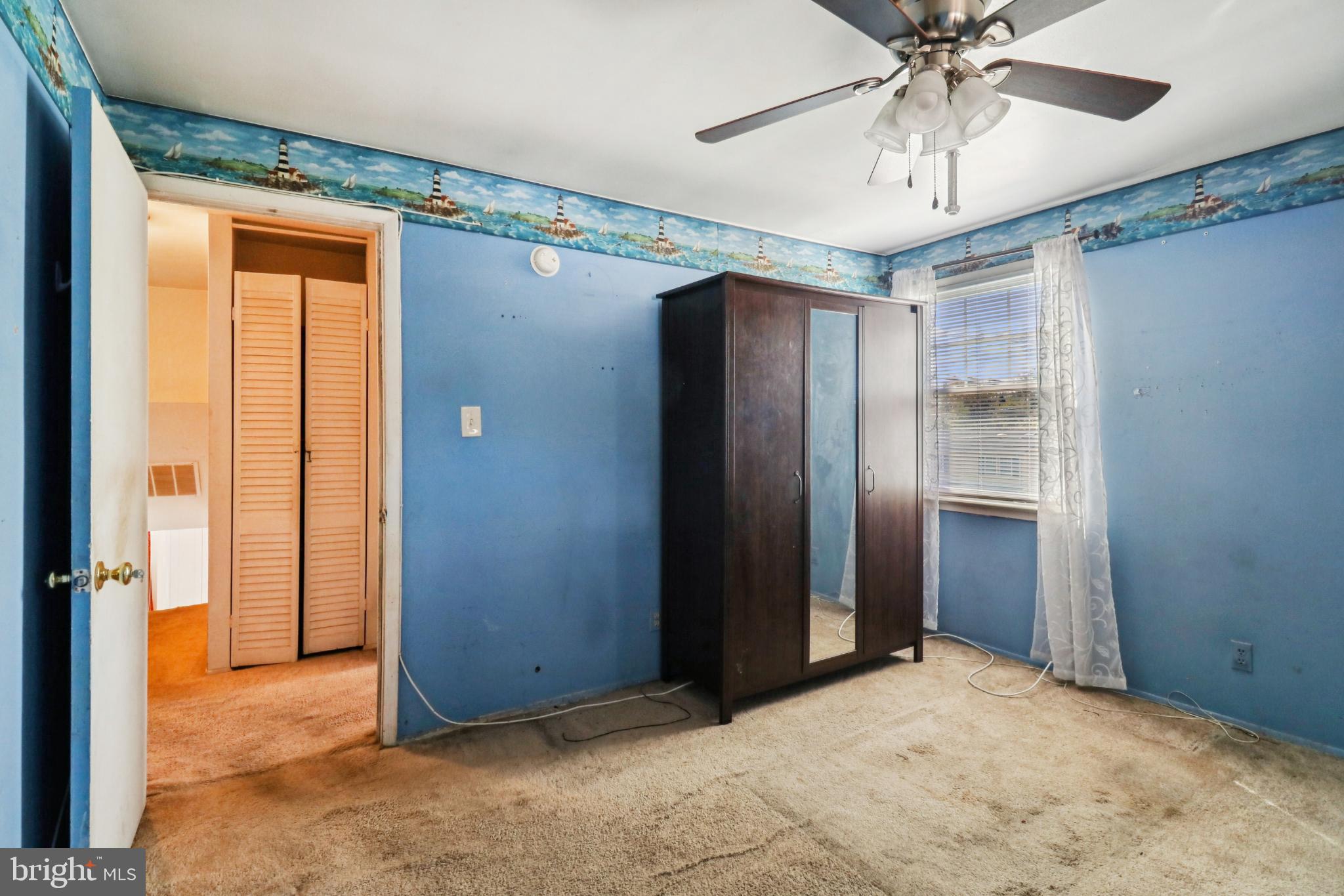 1916 Taylor Avenue Fort Washington, MD 20744 - Photo 47 of 64 an empty room with closet and a chandelier fan