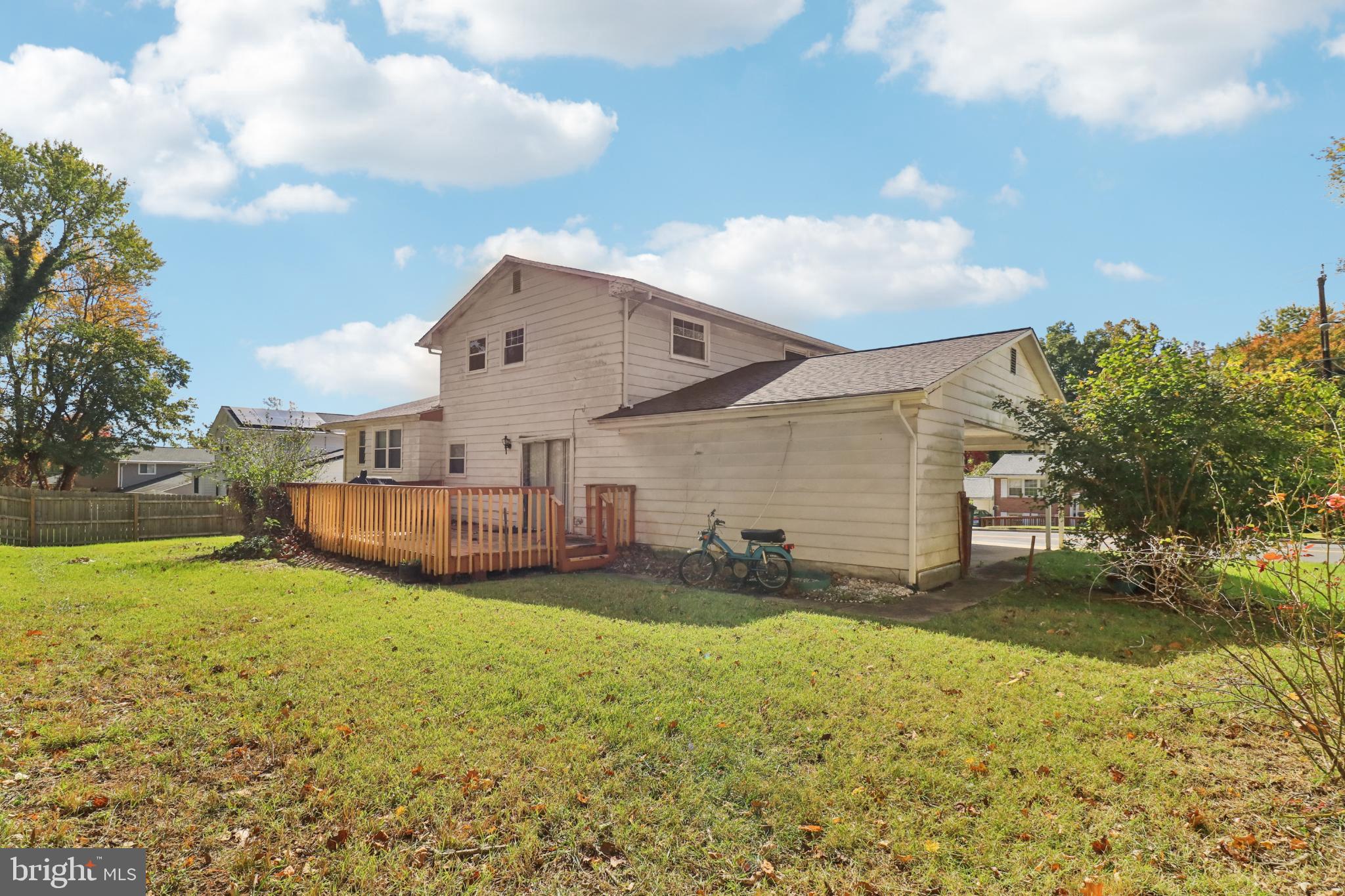 1916 Taylor Avenue Fort Washington, MD 20744 - Photo 56 of 64 a view of a house with a yard and a garden