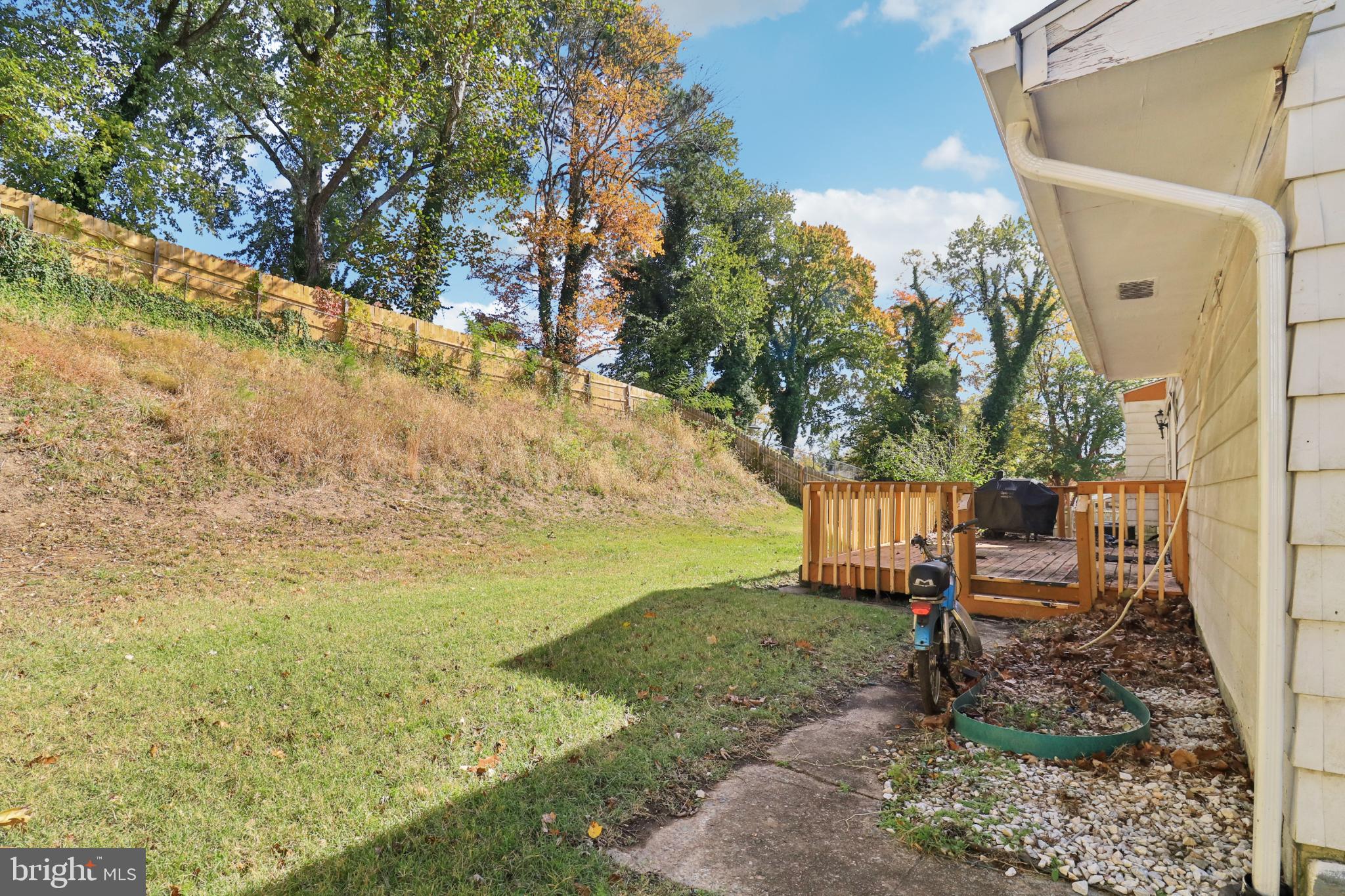 1916 Taylor Avenue Fort Washington, MD 20744 - Photo 58 of 64 a bench is sitting in the middle of a yard