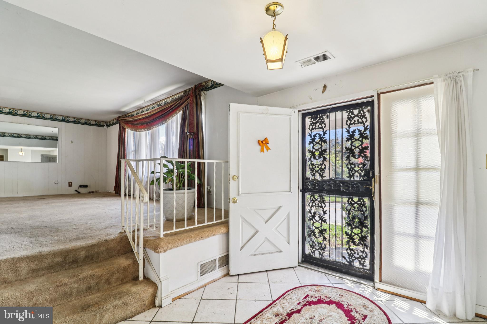 1916 Taylor Avenue Fort Washington, MD 20744 - Photo 6 of 64 a view of a hallway to a livingroom with furniture