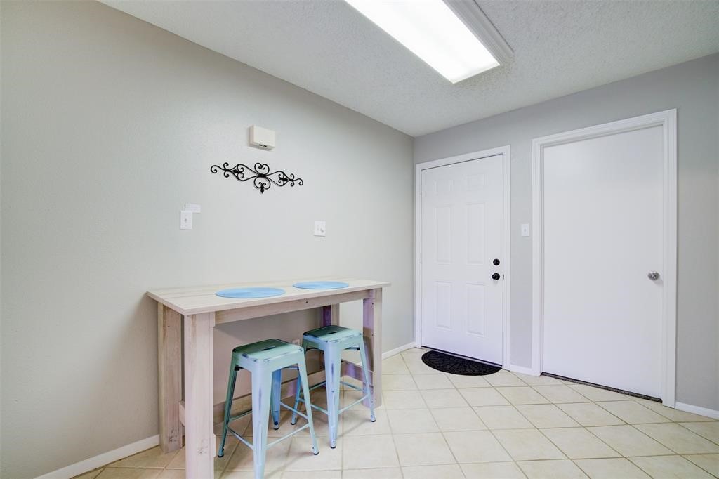 12900 Walden Road, Unit 202B Montgomery, TX 77356 - Photo 15 of 30 a view of entryway with table and chair