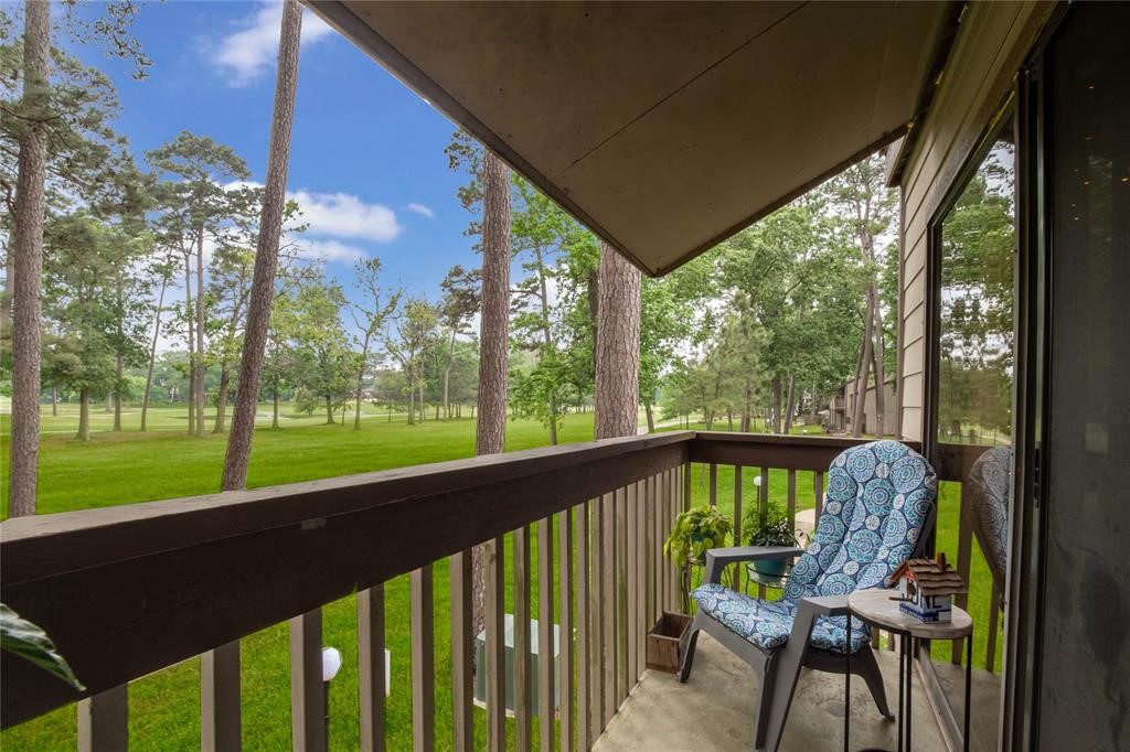 12900 Walden Road, Unit 202B Montgomery, TX 77356 - Photo 8 of 30 a view of a two chair in the balcony