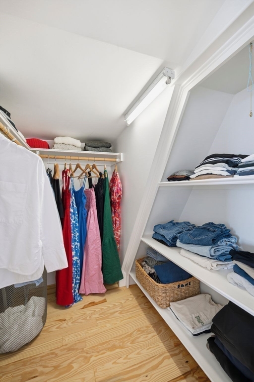 33 Franklin Street Marblehead, MA 01945 - Photo 36 of 42 a room with lots of white walls and shoes